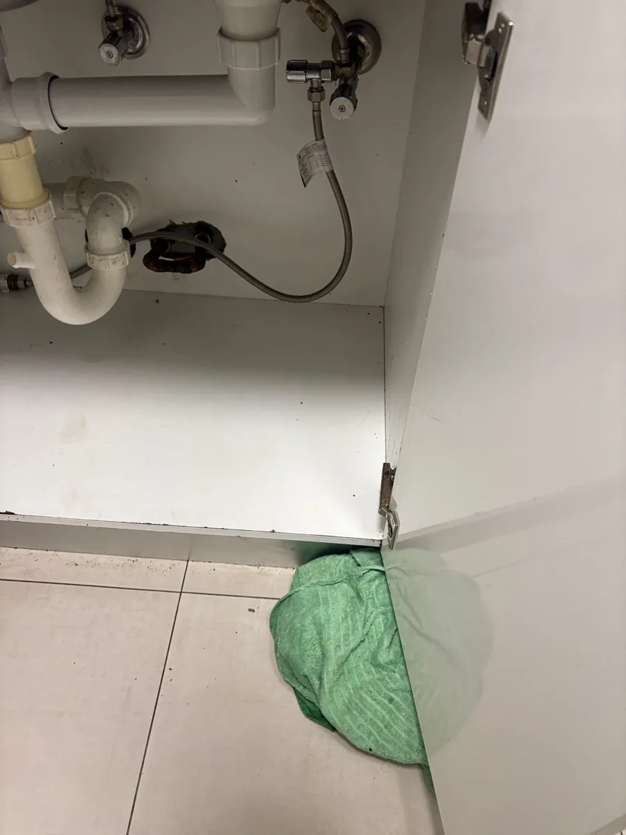 Under-sink plumbing and work area from our Westmead job after drain jetting
